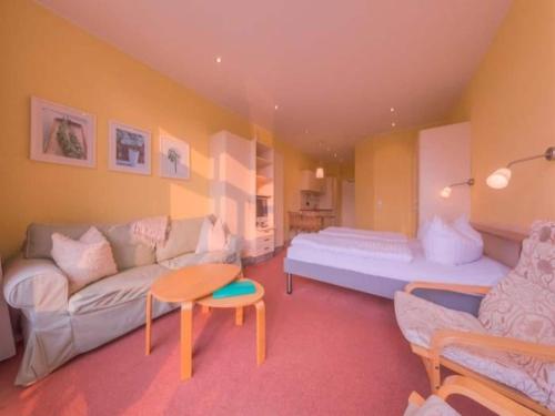 Giường trong phòng chung tại Elegant eingerichtete Ferienwohnung