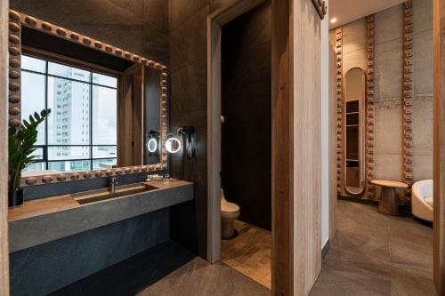 Koupelna v ubytování OZ Hotel Collection