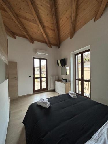 Ένα ή περισσότερα κρεβάτια σε δωμάτιο στο B&B Nonno Peppe