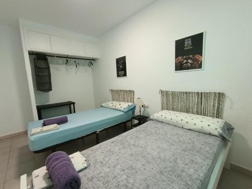 Ένα ή περισσότερα κρεβάτια σε δωμάτιο στο MOJACAR HOME AND BEACH