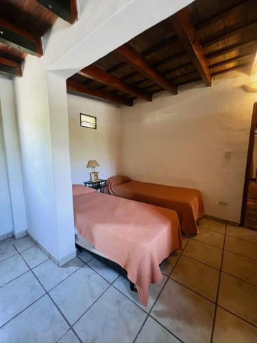 Postel nebo postele na pokoji v ubytování Portal del Chamán