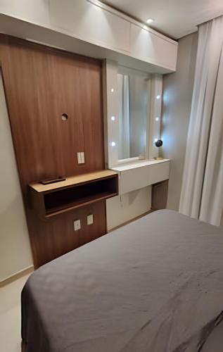 Ένα ή περισσότερα κρεβάτια σε δωμάτιο στο Apto. próx. Perini Business Park, UFSC & Whirlpool