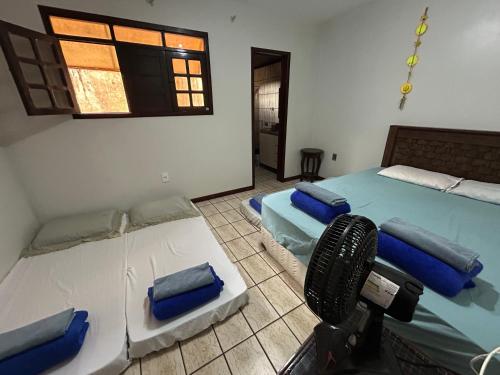 Ένα ή περισσότερα κρεβάτια σε δωμάτιο στο Hostel São Geraldo