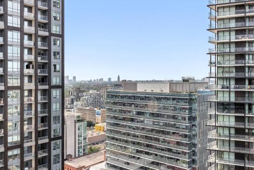 an aerial view of a city with tall buildings at Chic Downtown Retreat with Private Patio in Toronto