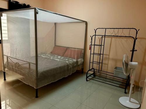 Ένα ή περισσότερα κρεβάτια σε δωμάτιο στο Chambre avec salle de bain privative