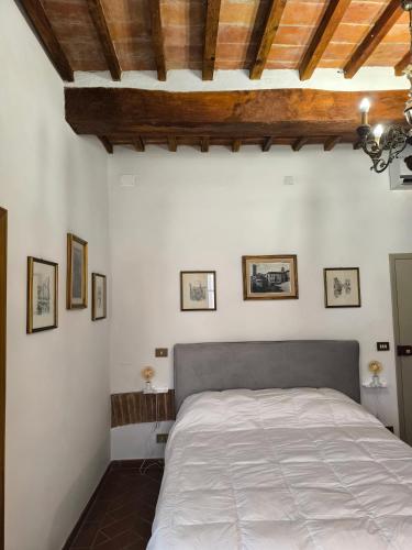 Ένα ή περισσότερα κρεβάτια σε δωμάτιο στο La casa di Fannie