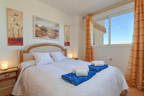 En eller flere senge i et værelse på Atico Playasol