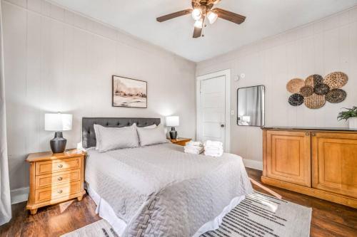 a bedroom with a bed and a ceiling fan at The Clearview Hideaway - Cozy in Memphis