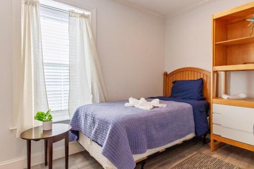 Ένα ή περισσότερα κρεβάτια σε δωμάτιο στο FIFA 2026 Sanctuary - Prime Spot