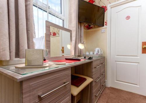 Kuchyň nebo kuchyňský kout v ubytování Valentine Lodge Over 21 Adult Couples Only