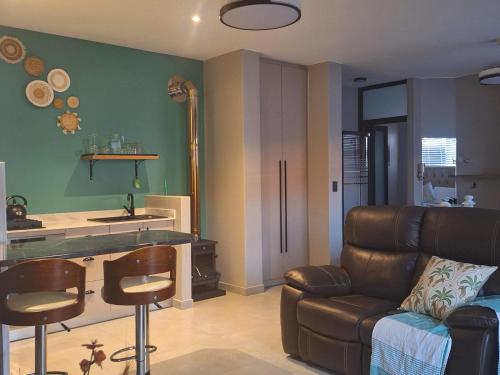 Η κουζίνα ή μικρή κουζίνα στο Calypso Sunset