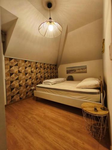 En eller flere senge i et værelse på La côte d'Opale