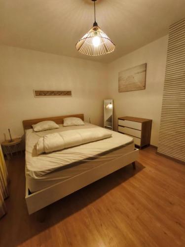 En eller flere senge i et værelse på La côte d'Opale