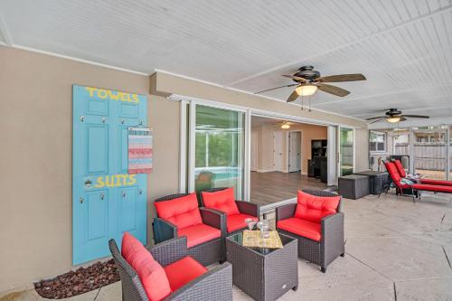 a living room with chairs and a ceiling fan at Heated Pool Family Fun at Silver Sands Clearwater in Clearwater