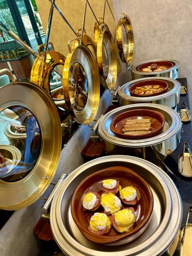 a bunch of plates of food on a table at The BOGUSZ Wladyslawowo in Władysławowo