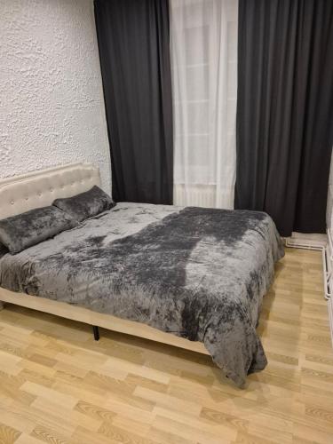 Ένα ή περισσότερα κρεβάτια σε δωμάτιο στο Finkenwerder Larisa's Nr 21