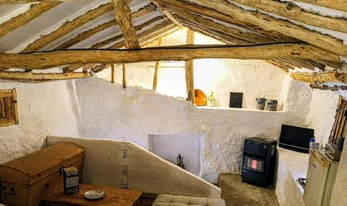 a living room with a couch and a window at GP Cortijo Palmera 