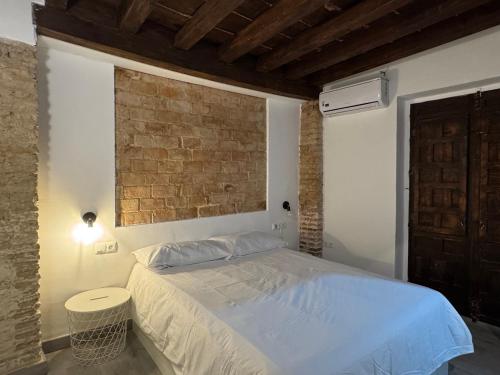 Ένα ή περισσότερα κρεβάτια σε δωμάτιο στο El Torreón 1870