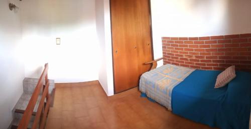 Ένα ή περισσότερα κρεβάτια σε δωμάτιο στο El Remanso centrico