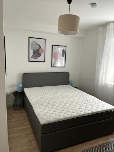 Ένα ή περισσότερα κρεβάτια σε δωμάτιο στο LAHNBLICK 3 Schlafzimmer, Parkplatz, WLAN