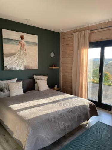 Postel nebo postele na pokoji v ubytování Un petit îlot de confort - made in Finland