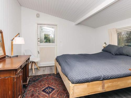 Ένα ή περισσότερα κρεβάτια σε δωμάτιο στο 4 star holiday home in Hornbæk