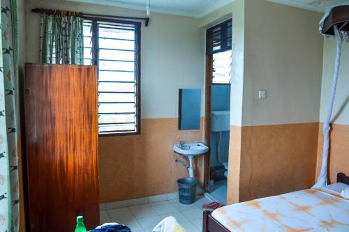 Kúpeľňa v ubytovaní Ogalis K-coast Hotel