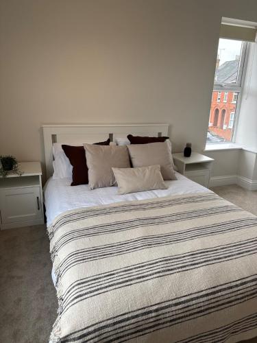 Ένα ή περισσότερα κρεβάτια σε δωμάτιο στο Central Aldershot Private room, Near Station & Town Centre