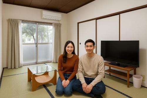 TV a/nebo společenská místnost v ubytování さんこ戸建て1号棟