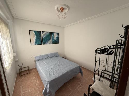 Cama o camas de una habitación en La Casita del Coso