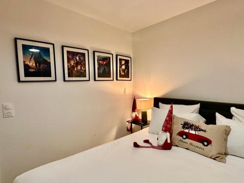 Ένα ή περισσότερα κρεβάτια σε δωμάτιο στο Appt Vue Parc Disneyland-PARIS - Terrasse - Parking Privé