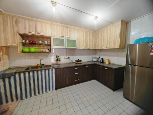 Η κουζίνα ή μικρή κουζίνα στο Saradise Staycation