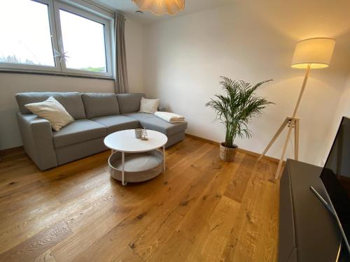 Posezení v ubytování Gemütliche Oase im Voralpenland