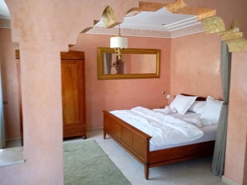 Ένα ή περισσότερα κρεβάτια σε δωμάτιο στο Dar wafaa 2 belle appartement de luxe