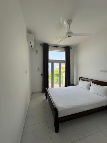 Postel nebo postele na pokoji v ubytování In the heart of Colombo 2 Bedrooms Apartment