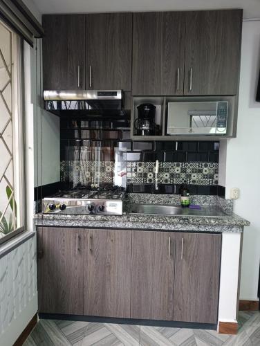 Dapur atau dapur kecil di Minisuite, Piso 1