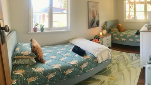 Ένα ή περισσότερα κρεβάτια σε δωμάτιο στο River Cottage Retreat Jalbarragup