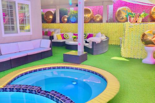 a room with a swimming pool in a house at Casa de Bloom Venue - Your Perfect Event Space in San Diego