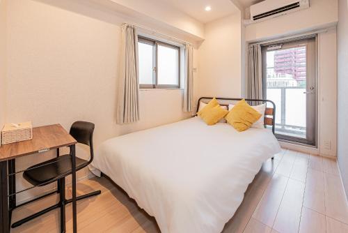 Ένα ή περισσότερα κρεβάτια σε δωμάτιο στο Louis stage asakusa