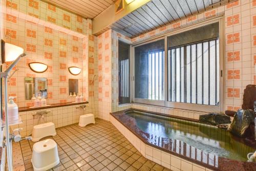 Ένα μπάνιο στο Town Hotel Nakaya