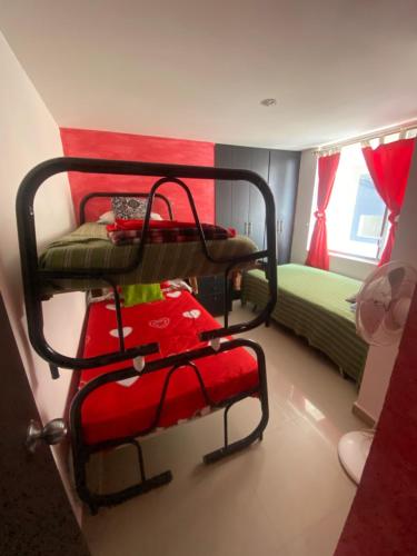 Una cama o camas en una habitación de Departamento frente al mar edificio Arena Plaza