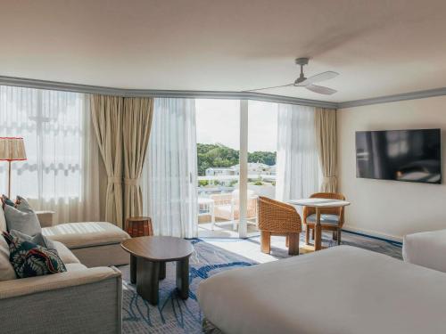 Кровать или кровати в номере Elysium Noosa Resort - MGallery Collection