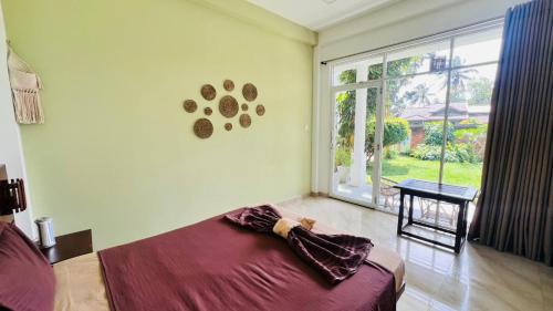 Postel nebo postele na pokoji v ubytování Lost Paradise Sri Lanka