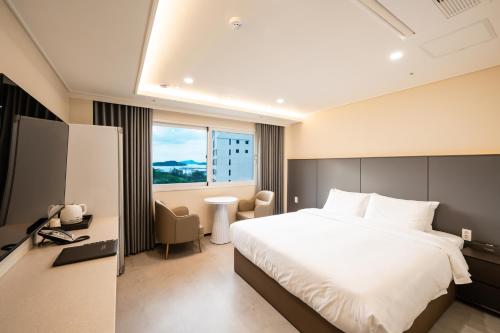 Giường trong phòng chung tại 바반트관광호텔