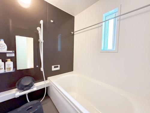 Ένα μπάνιο στο VILLA BLUEOCEAN AWAJIYA SOUTHヴィラブルーオーシャン淡路屋south