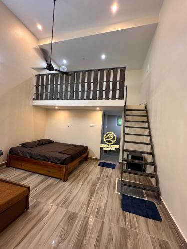 Un pat sau paturi într-o cameră la Wind and Wave Resorts and Luxury Rooms Near Pondy and Auroville