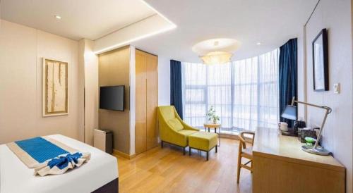 Postel nebo postele na pokoji v ubytování Yitel Shenyang Sanhao Street Shengjing Hospital