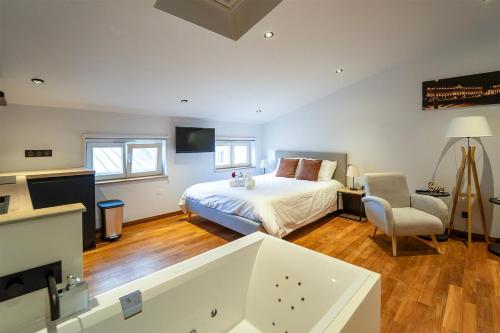 Ένα ή περισσότερα κρεβάτια σε δωμάτιο στο L escapade de Stan