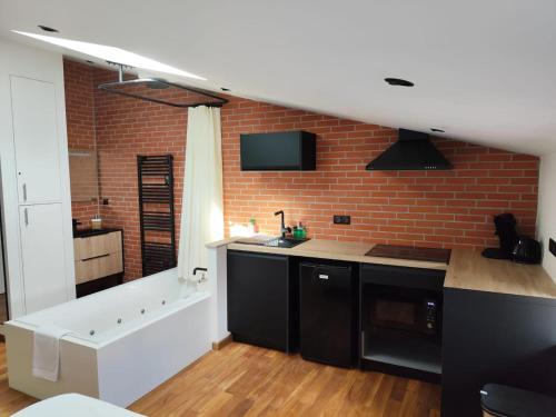 Η κουζίνα ή μικρή κουζίνα στο L escapade de Stan