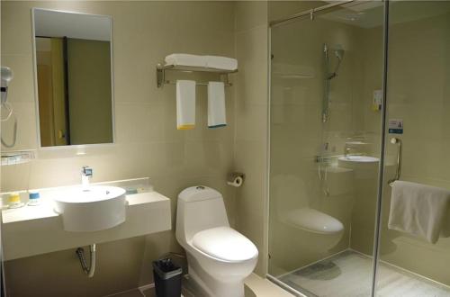 Ένα μπάνιο στο City Comfort Inn Dongguan Dalang Yuanda City Plaza